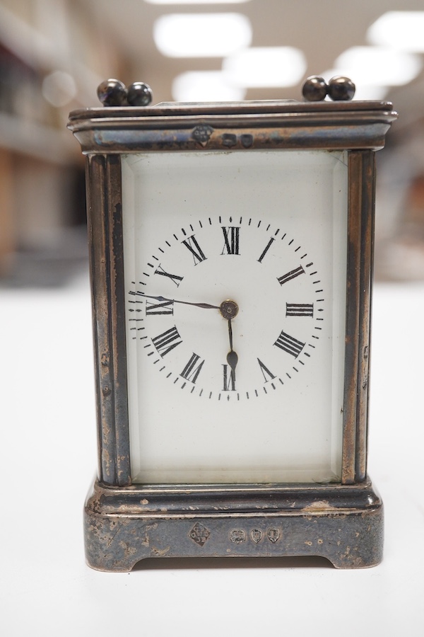 A late Victorian silver mounted miniature carriage timepiece, George Betjemann & Sons, London, 1890, 75mm excluding handle. Condition - poor